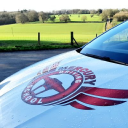 Mercury Driving School logo