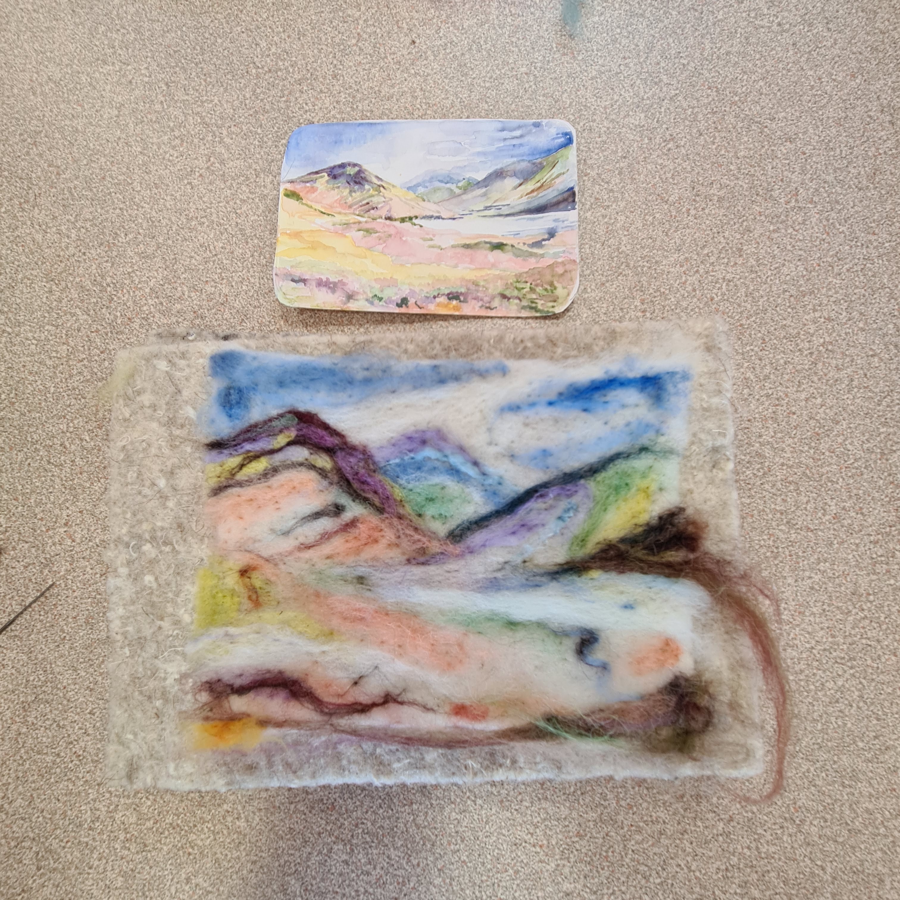 Create a needlefelted landscape