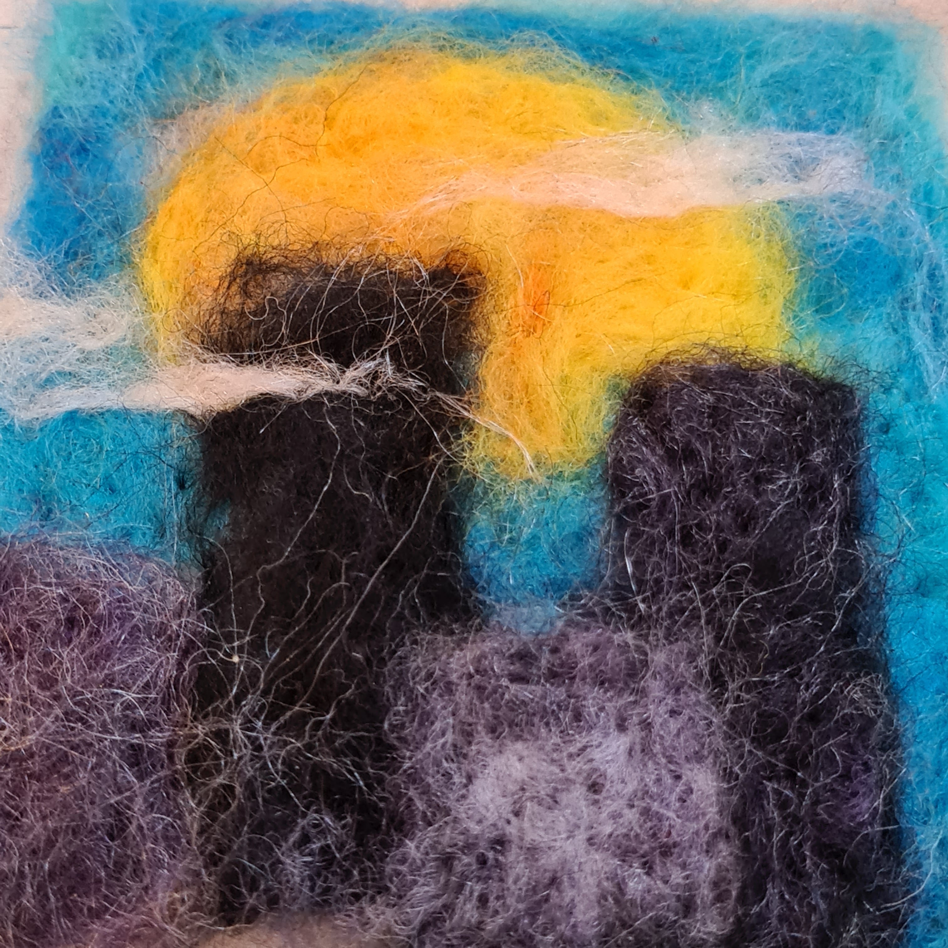 Create a needlefelted landscape