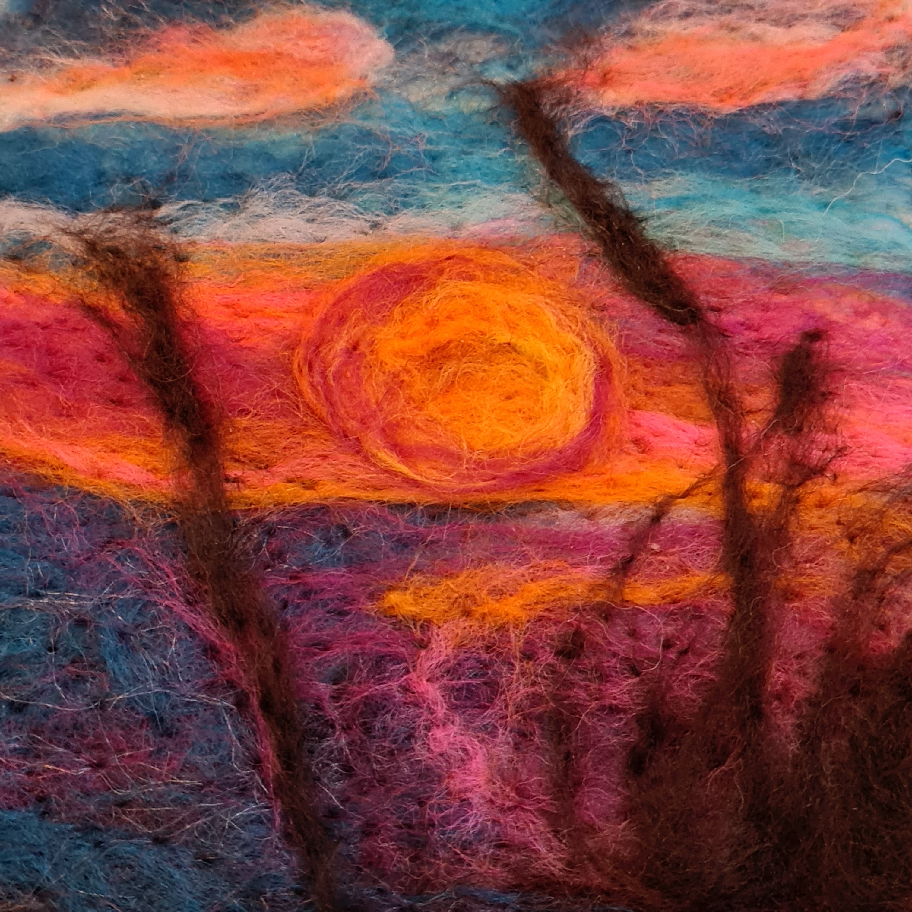 Create a needlefelted landscape