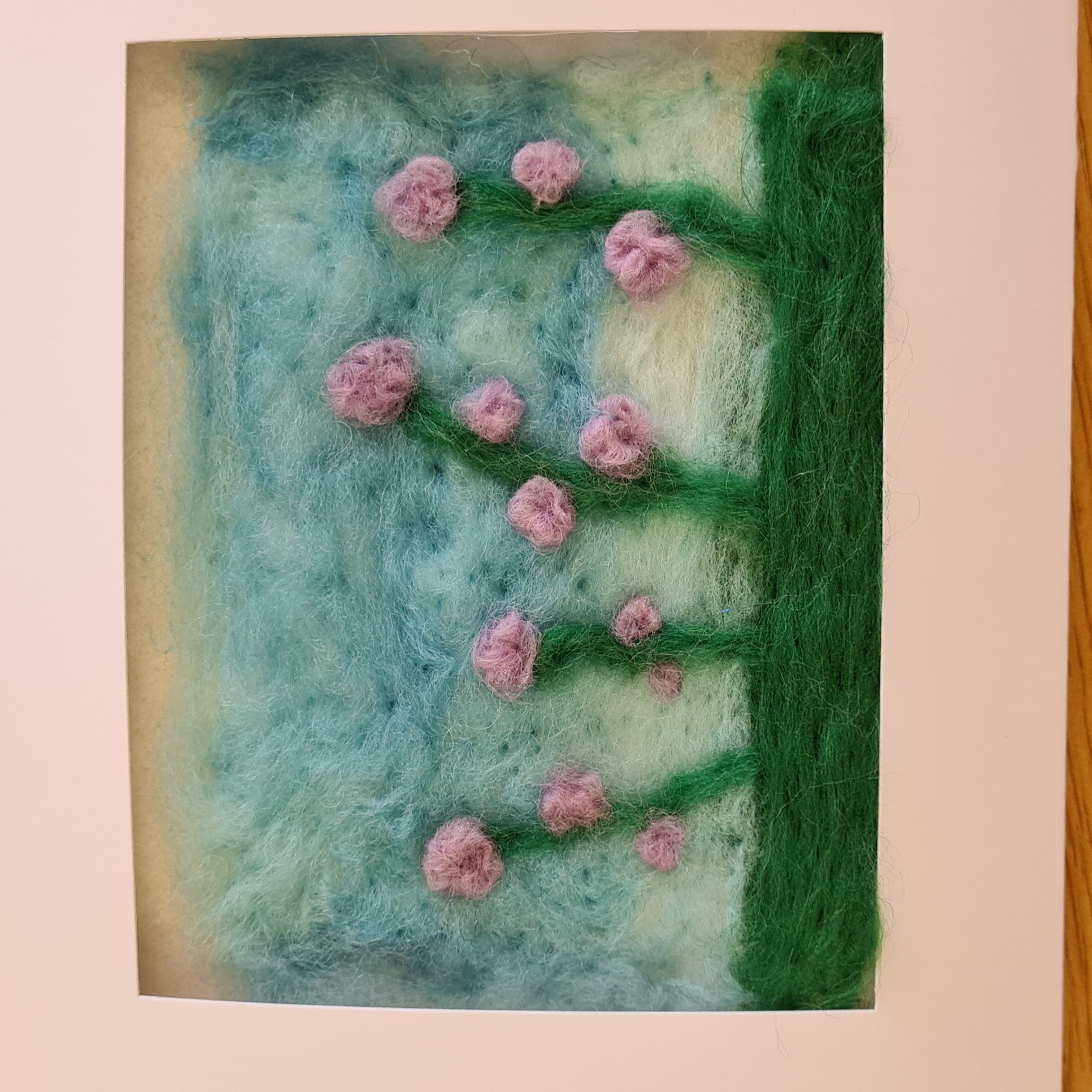 Create a needlefelted landscape