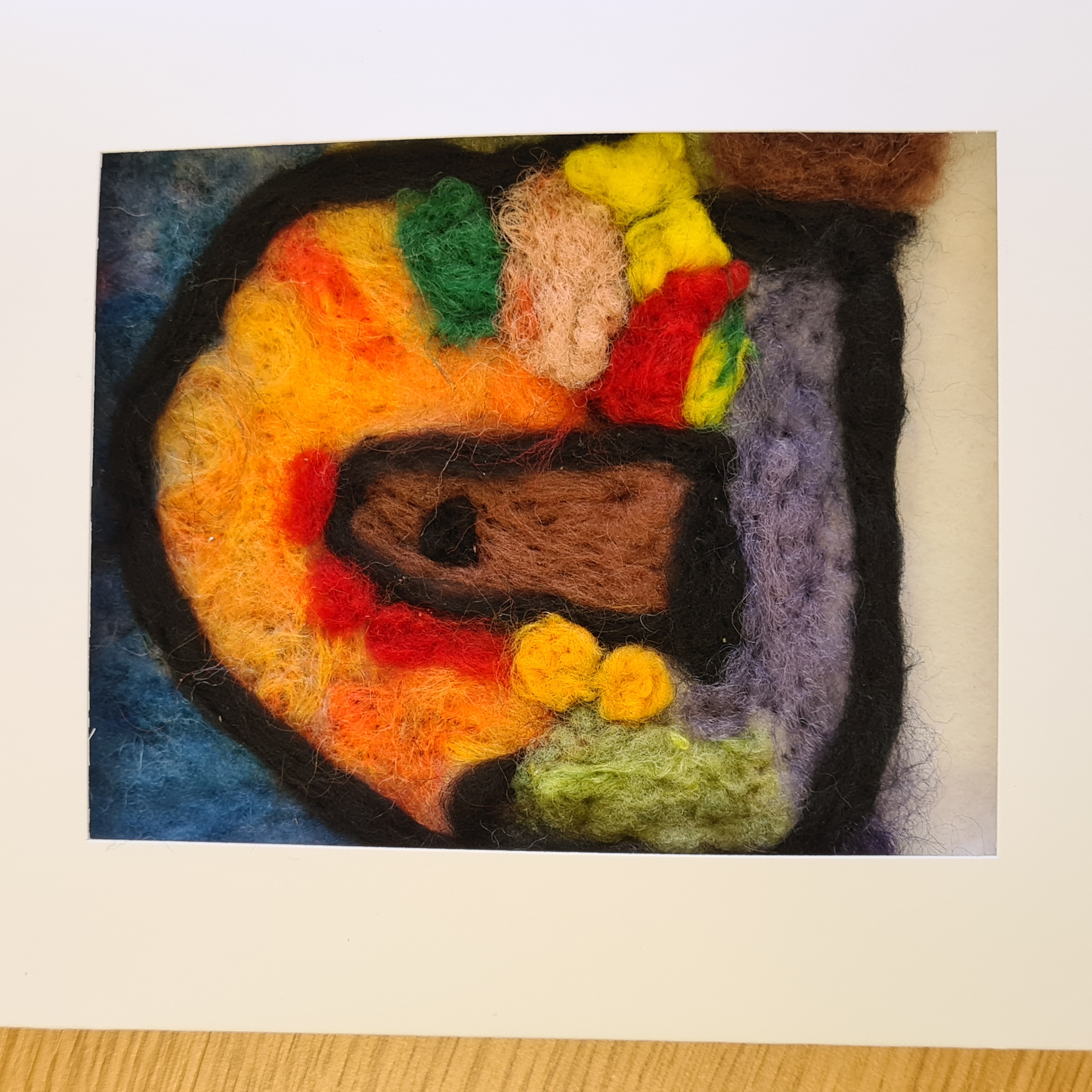 Create a needlefelted landscape